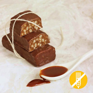 Barretta iperproteica al cioccolato caramello e arachidi senza glutine