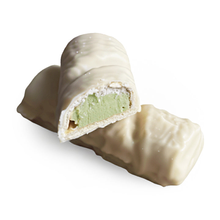 Barre crémeuse hyperprotéinée au chocolat blanc fourrée à la pistache